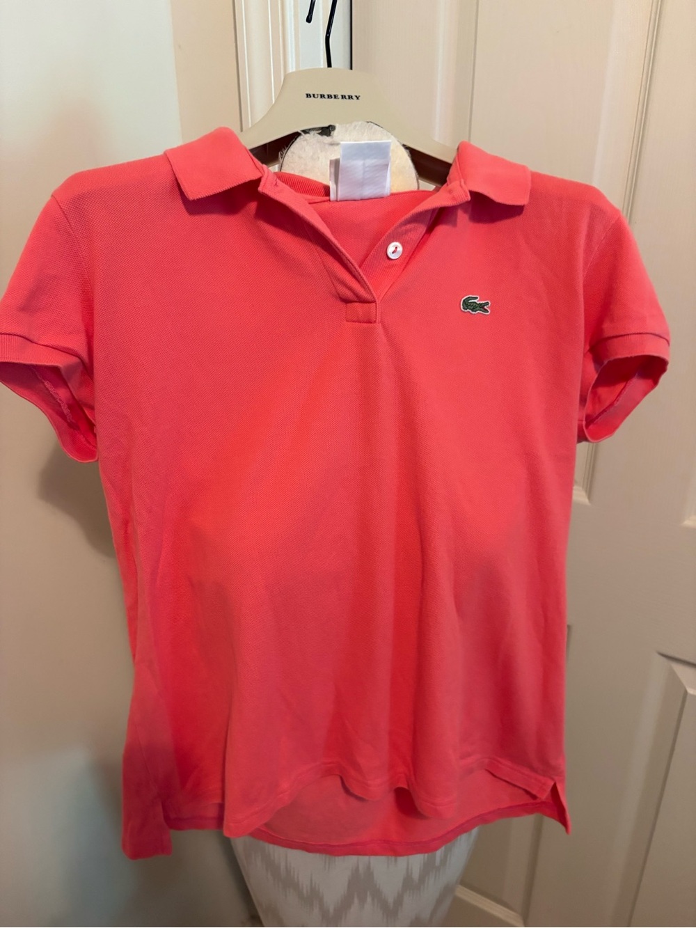 Lacoste women’s 44 Coral Pink Polo Top slit side